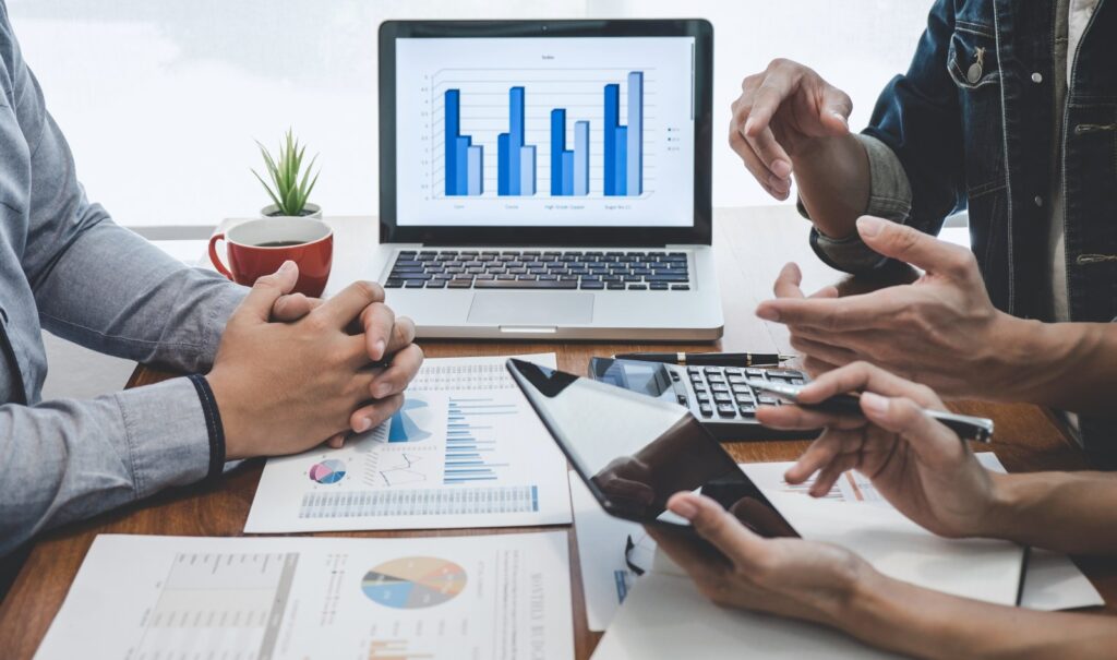 Accounting meeting showing charts and spreadsheets